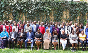County representatives and commission staff pose for a photo during the model GRM Policy development workshop in Nairobi